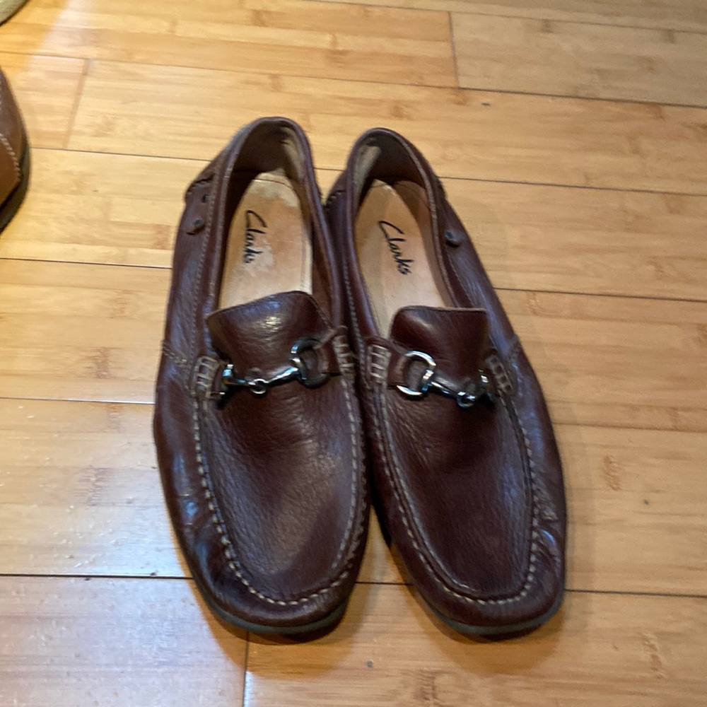 Men’s brown loafers with the silver detail heart